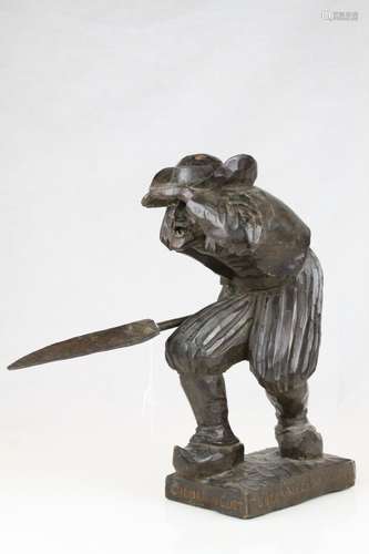 Carved Wood Figure of ' Chouan au Guet ' holding a Scythe, signed Jul Martin, 35cms high