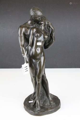 Bronzed kissing couple figure signed Donaldson