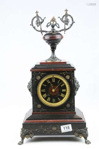 Victorian Slate and Marble Mantle Clock surmounted by an Urn Shaped Finial, raised on Metal Lion Paw