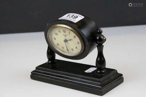 Early 20th century Swing Clock in Ebonised Cased having German FMS (Friedrich Mauthe Schwenningen)