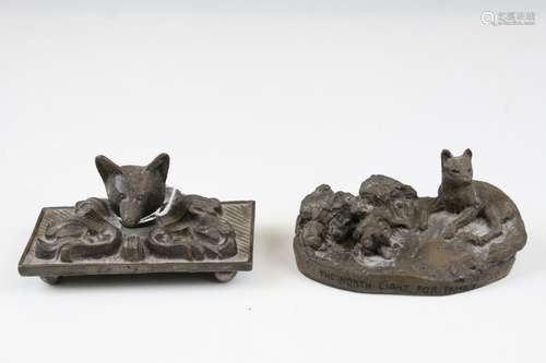 Bronze Desk Paperweight in the form of a Fox Head surrounded by Scrolls, 10cms long together with an