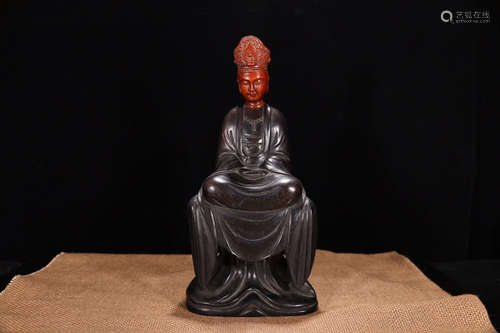 A Chinese Red Sandalwood Sitting Guanyin Statue