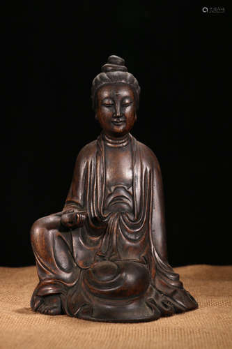 A Chinese Aloeswood Carved Guanyin Sitting Statue