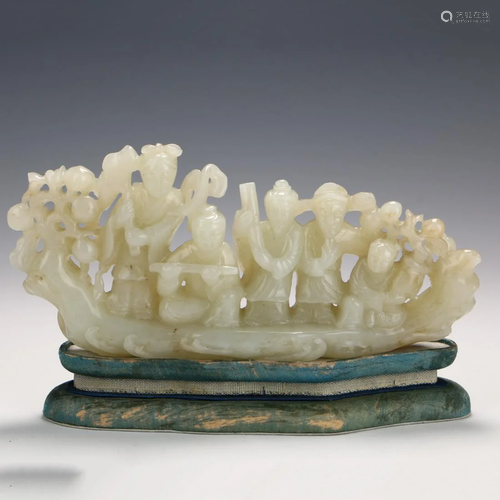 A CHINESE HETIAN JADE CARVED FIGURE ORNA…