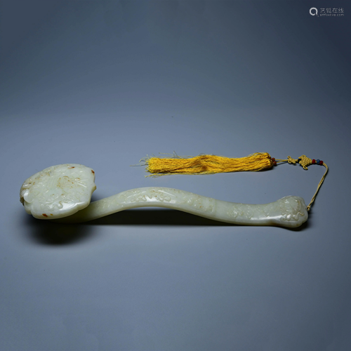 A CHINESE WHITE JADE RUYI ORNAMENT