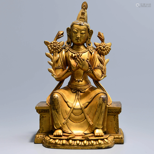 A CHINESE SITTING STATUE OF MANJUSRI