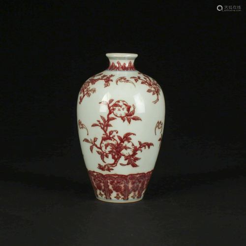 A CHINESE COPPER RED PORCELAIN PLUM VASE