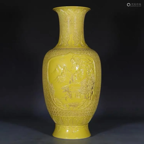 A CHINESE YELLOW GLAZED CARVED PORCELAIN …