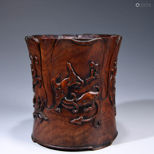 A CHINESE ROSEWOOD DRAGON PATTE…