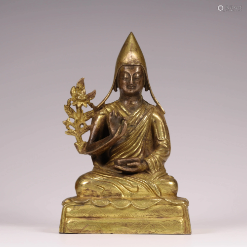 A CHINESE BRONZE GILDING SITTING STATUE OF …