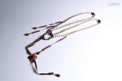 A STRING OF CHINESE PEARL & RUBY COURT BEADS