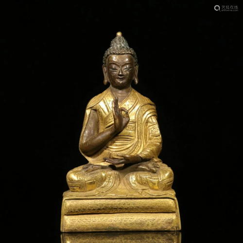 A CHINESE GILD COPPER BUDDHA STATUE
