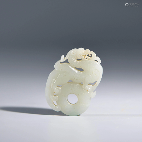 A CHINESE WHITE JADE BI ORNAMENT