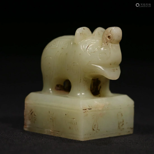 A CHINESE CARVED HETIAN JADE SEAL