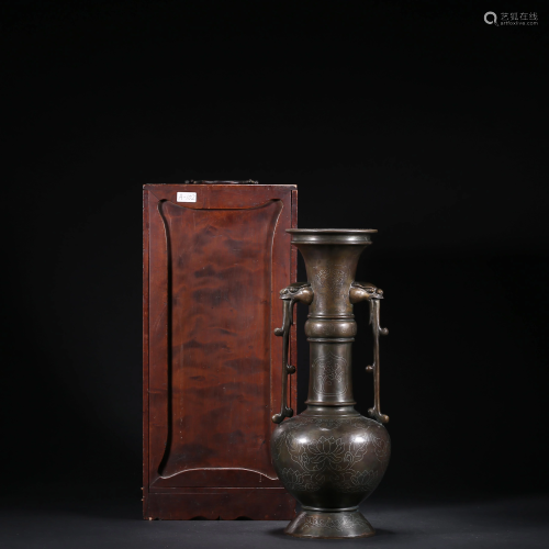 A CHINESE BRONZE DOUBLE-EARED FLASK WITH A…