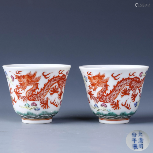 A PAIR OF CHINESE IRON RED DRAGON PATTERN…