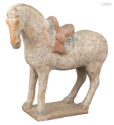 A Chinese Tang Dynasty Painted Pottery Saddled Horse