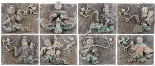 A Set of Eight Chinese Painted Pottery Tiles Depicting The Eight Immortals