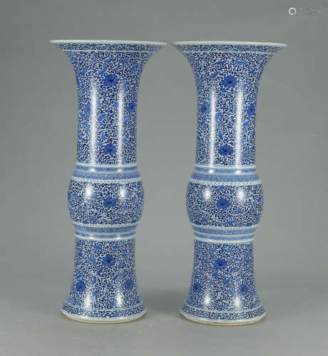 A PAIR OF CHINESE BLUE AND WHITE FLOWERS FLOWER GU VASE