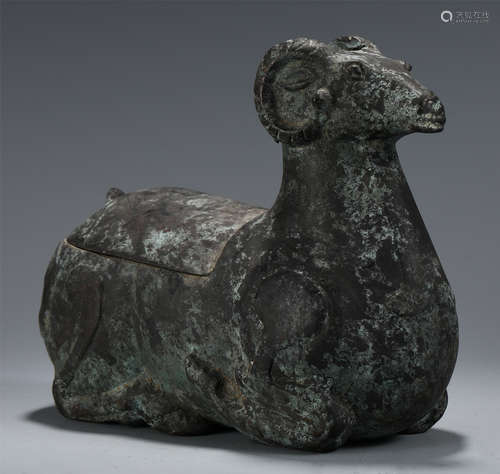 AN ANCIENT CHINESE BRONZE SHEEP SHAPED TABLE ITEM