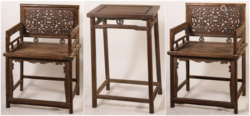 A SET OF CHINESE HARDWOOD CARVED ARMCHAIRS AND TABLE