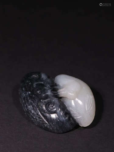 A Chinese Hetian Seed Jade Ornament