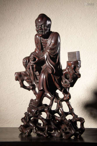 A Chinese Longyan Wood Figure of Arhat