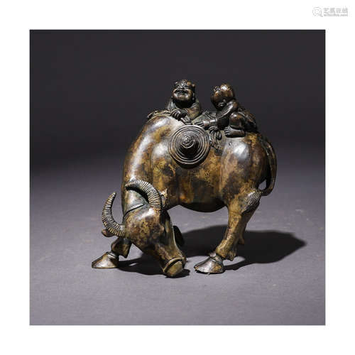 A Chinese Bronze Figure of Boy on Buffalo