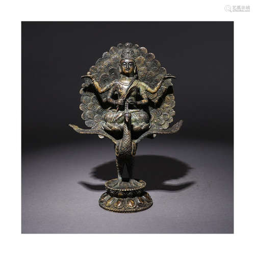 A Chinese Bronze Figure of
Maha-mayura-vidy-rajni