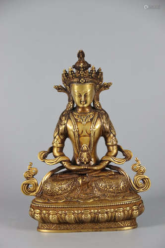 A Chinese Gilt-Bronze Figure of Buddha