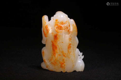 A Chinese Hetian Seed Jade Ornament