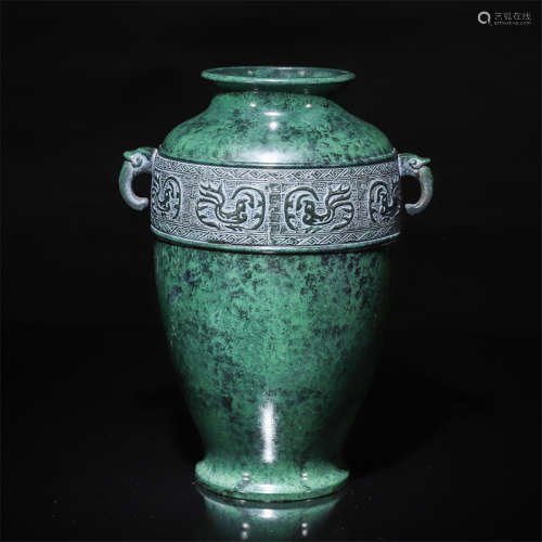 A Chinese Bronze Vessel with Beast Handles