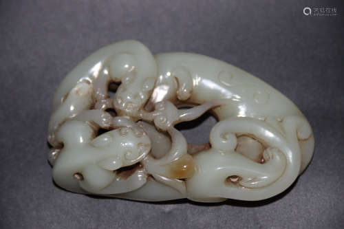 A Chinese Hetian Seed Jade Ornament