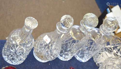 Group of four cut glass decanters, various sizes, with stoppers, largest 30cm high (4)