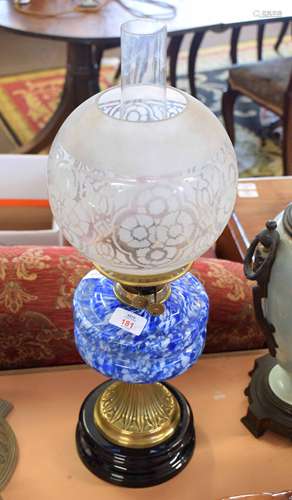 Victorian oil lamp, frosted shade over a mottled glass font, brass support and black slag