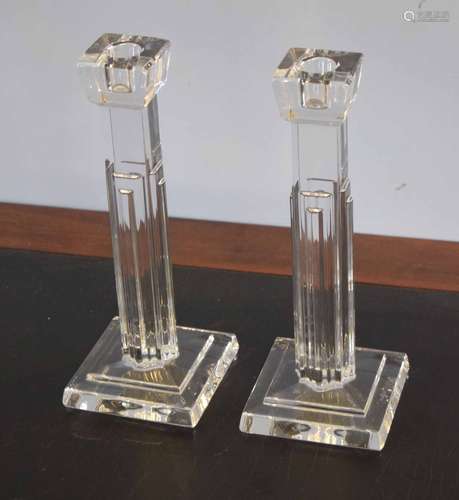 Pair of Waterford glass candlesticks, modelled with Corinthian columns on square bases with