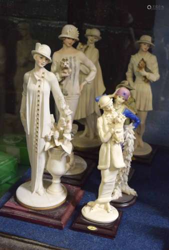 Group of Armani figurines (8)
