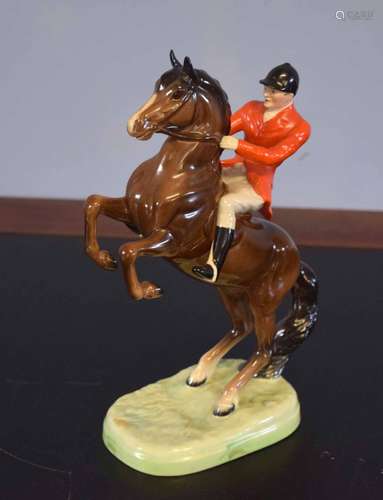 Beswick model of a huntsman on a rearing horse