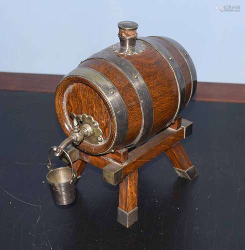 Vintage oak and silver plated mounted presentation spirit barrel, with tap and bucket on integral