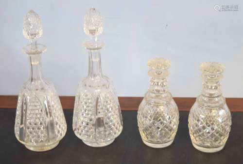 Pair of late 19th century cut glass decanters and stoppers and two further decanters with mushroom