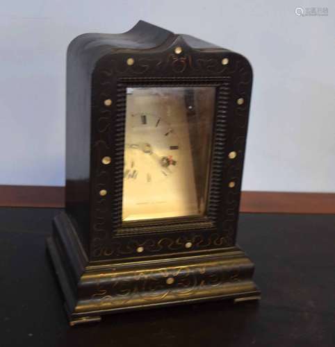 French mantel clock, probably retailed by Rochet of Paris, white face with circular Roman chapter