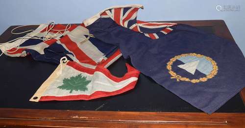 Two vintage Union Jacks and a further Canadian pennant