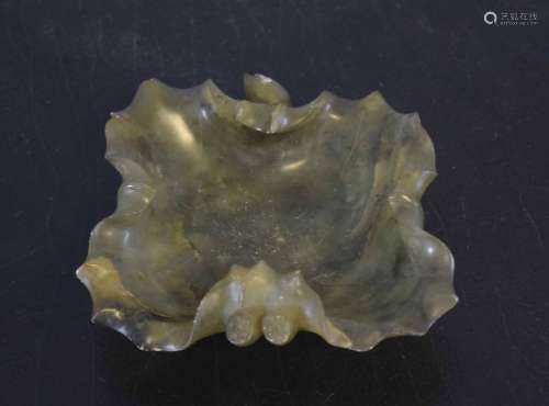 Spinach green jade dish with a carved bud handle and lobed shape