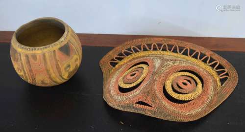 Tribal art Papua New Guinea bowl decorated with faces