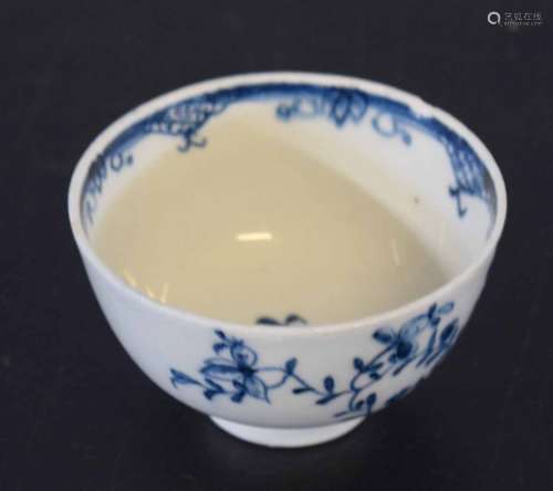 18th century Lowestoft porcelain tea bowl with blue and white floral design