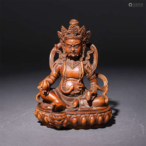 A Chinese Boxwood Buddha Statue of Yellow Jambhala