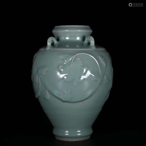 A Chinese Carved Celadon Glazed Porcelain Jar