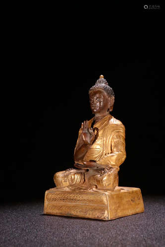 A Chinese Bronze Gilding Sakyamuni Statue