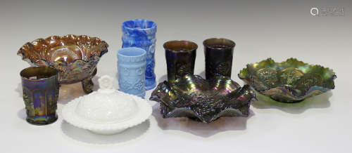 A small group of Carnival glass, including three Northwood Dandelion tumblers, a Sowerby Diving