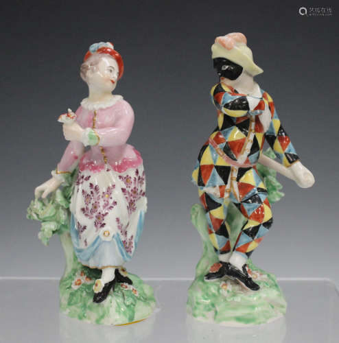 A pair of Derby porcelain figures, modelled as Harlequin and Columbine, circa 1770, each raised on a
